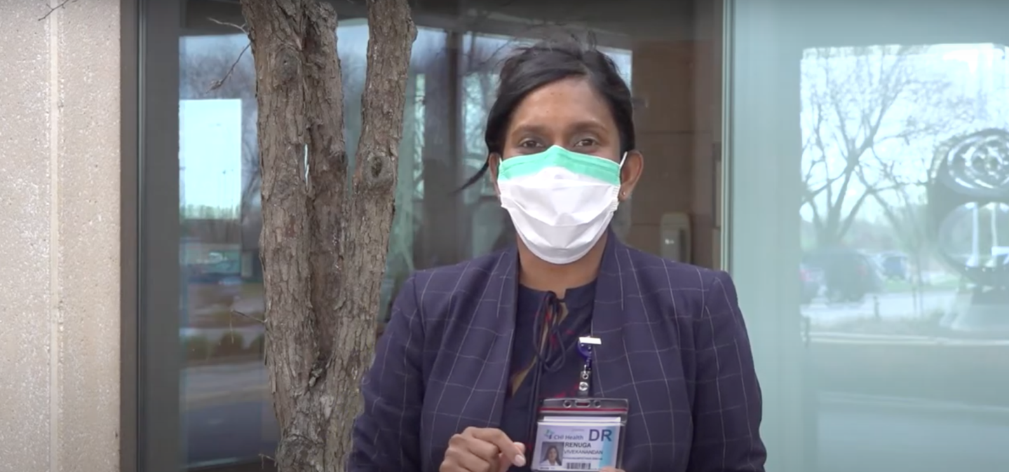Dr. V demonstrating how to properly wear a mask||