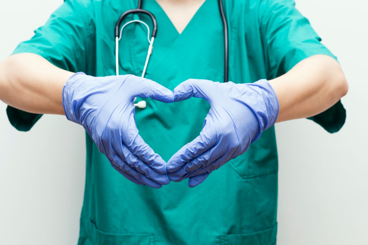 Doctor Making Heart Shape With Hands