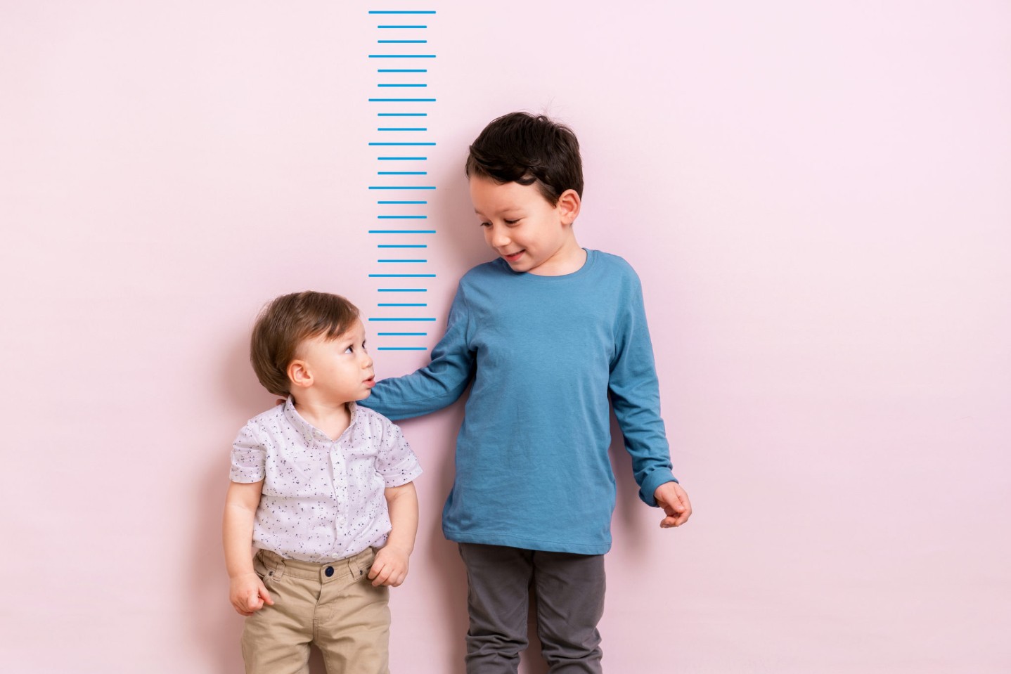 Child measuring his height
