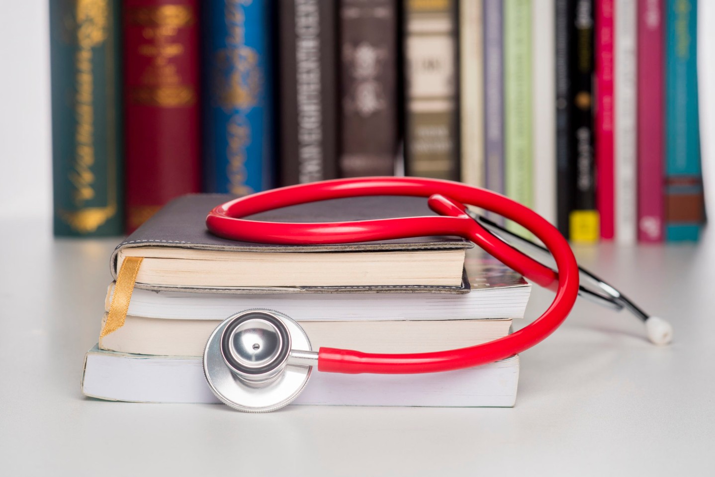 Concept of medical education with book and stethoscope