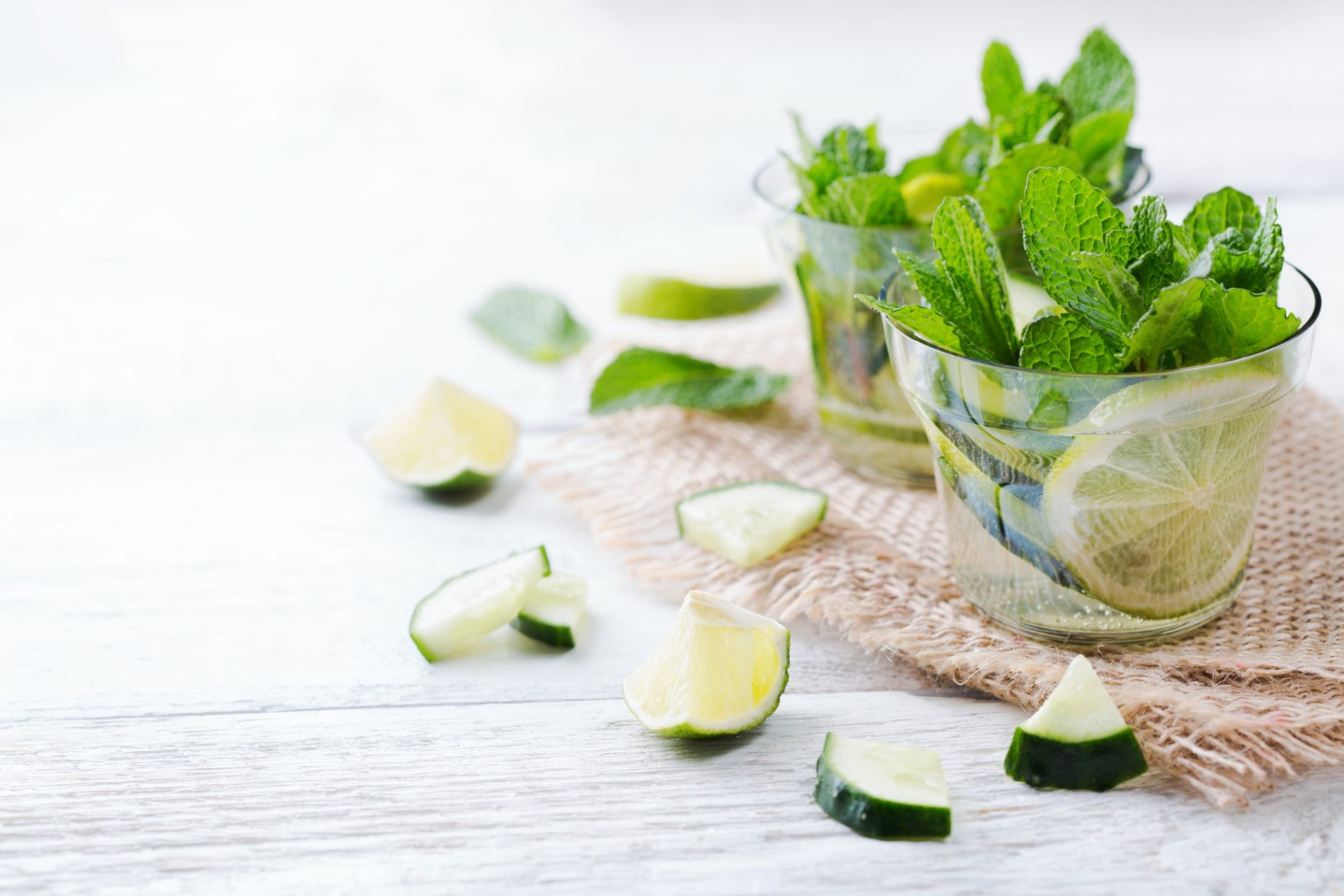 Cucumber lime mint fresh infused water detox drink cocktail lemonade