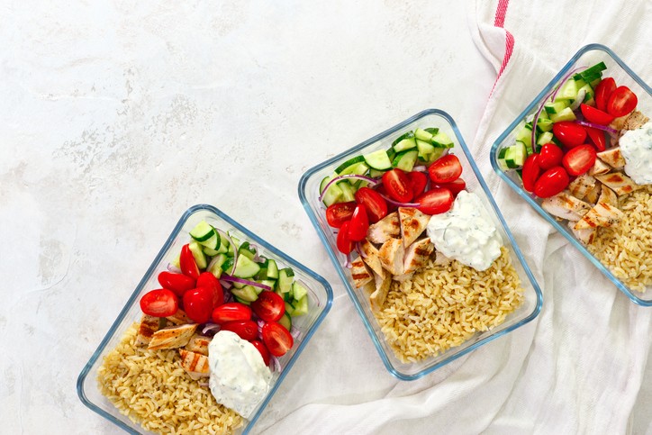Greek chicken with tzatziki prepared and ready to eat in a take away lunch boxes