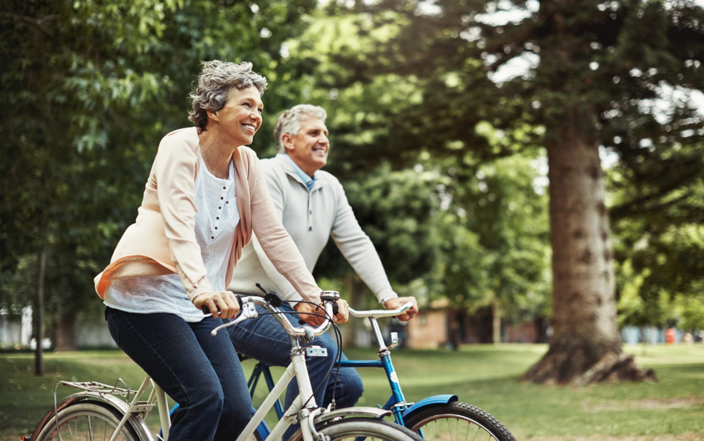 Cropped shot of a mature couple enjoying a bike ride in the park