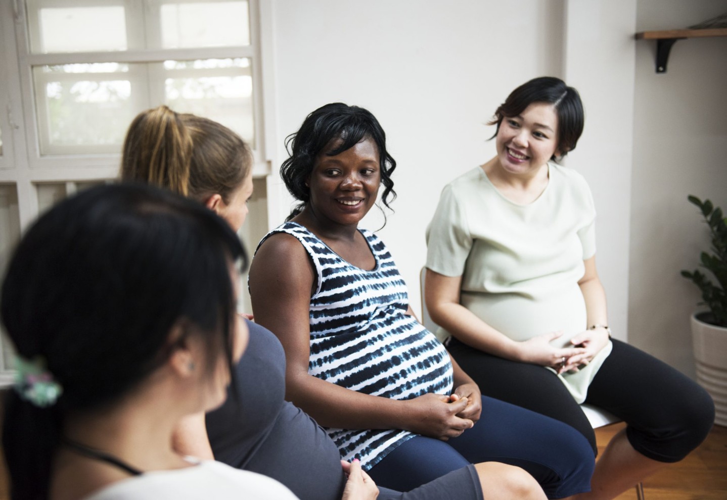 Pregnant women in a class