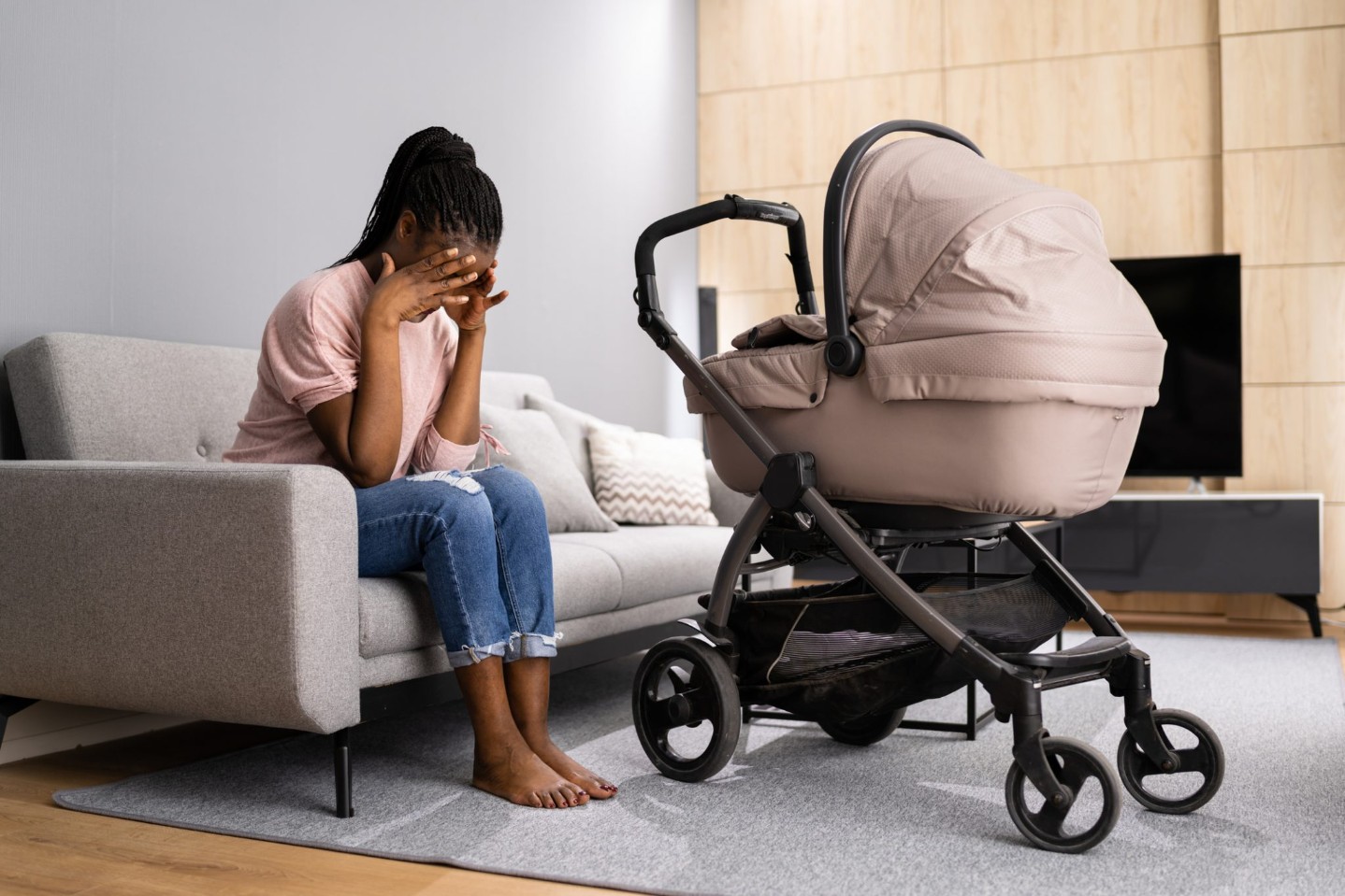 Depressed Unhappy African American Woman With Newborn