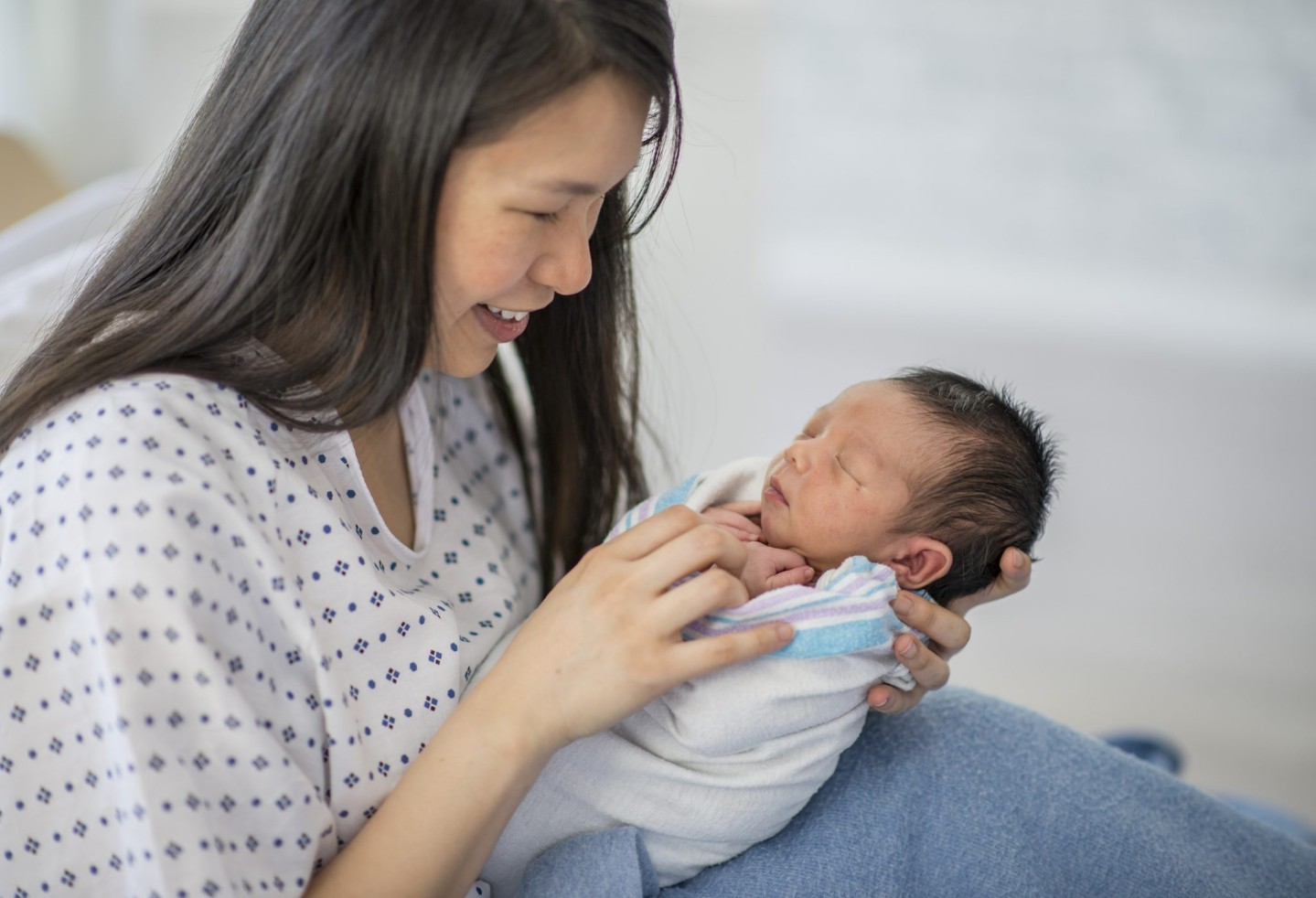 mother holding her baby