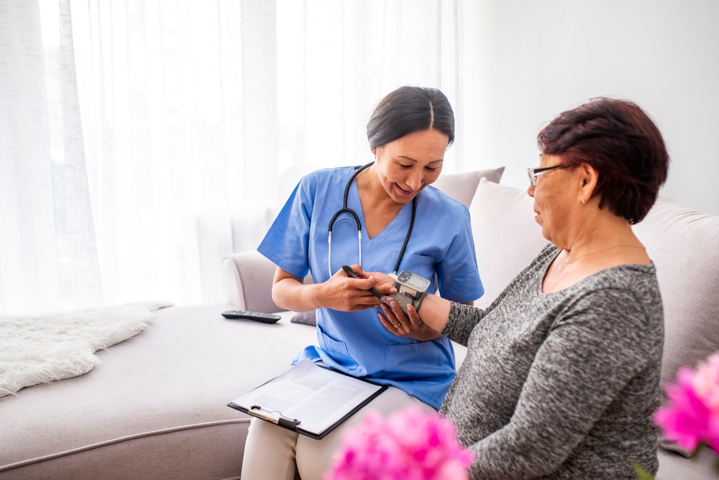 Middle aged woman talking to her doctor